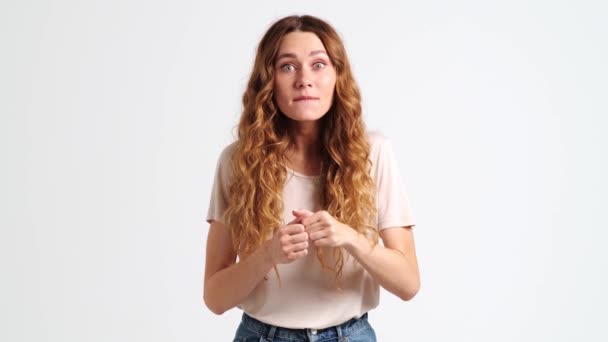 Happy Woman Doing Winner Gesture Standing Isolated White Wall Studio — Stock video