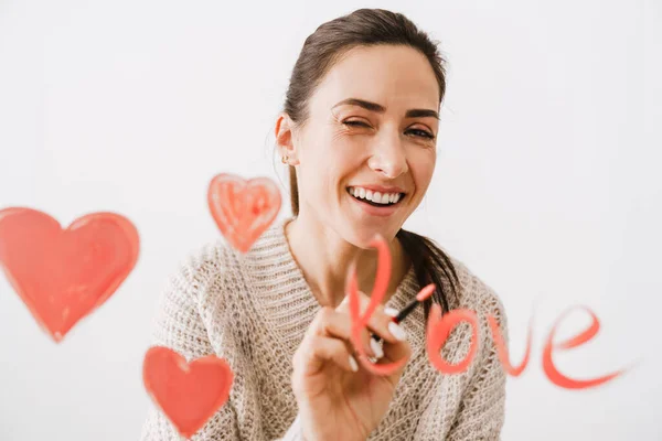 Bela Jovem Sorridente Amor Atraindo Corações Frente Dela Isolado Sobre — Fotografia de Stock