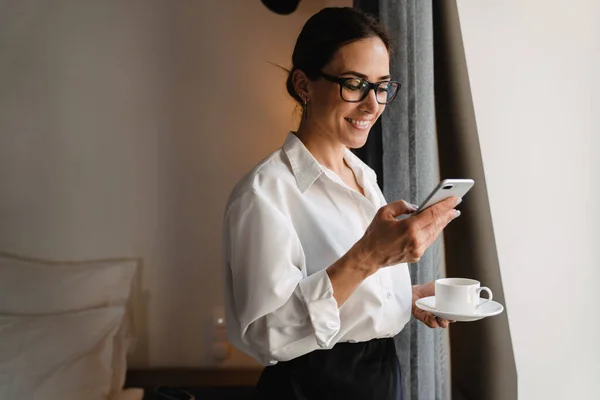 Smiling Middle Aged Brunette White Businesswoman Smart Wear Standing Window — Stok Foto