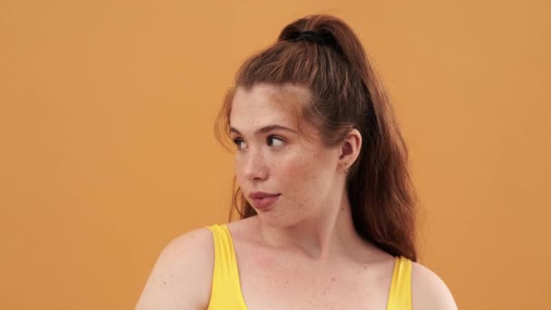 Beautiful Size Woman Looking Aside Standing Isolated Yellow Background — Stock Video