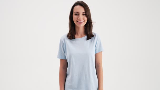 Beautiful Woman Wearing Basic Shirt Looking Camera Standing Studio Isolated — Stockvideo