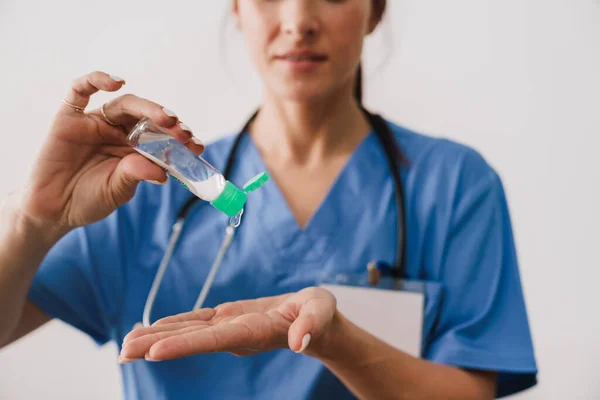 Close Female Doctor Sanitizing Her Hands Isolated White Background — Stock Photo, Image