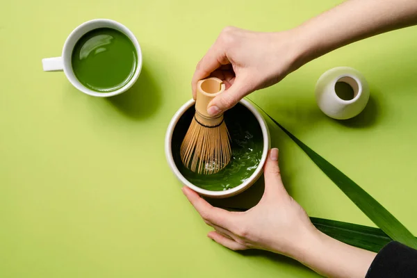 Close Shot Woman Hands Mixing Matcha Cup Green Studio — Stock Photo, Image
