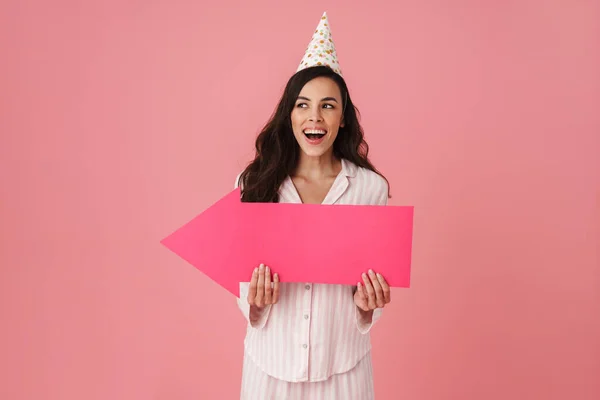 Joyful Woman Party Cone Laughing While Posing Arrow Placard Isolated — Stock Photo, Image