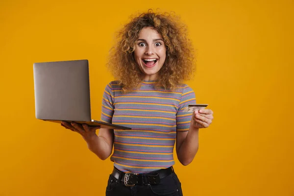 Happy Young Casual Woman Holding Laptop Computer Standing Yellow Wall — Stock Photo, Image