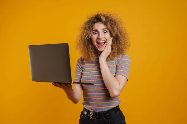 Happy Young Casual Woman Holding Laptop Computer Standing Yellow Wall — Stock Photo, Image