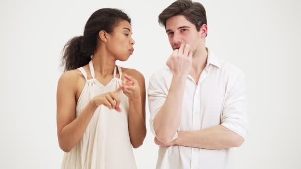 Thinking Couple Discussing Something Isolated White Background Studio — Stock Video