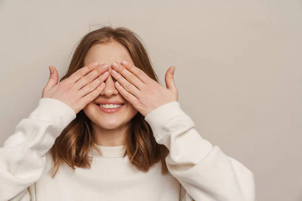 Young Happy Woman Smiling While Covering Her Eyes Isolated Grey — Stock Photo, Image