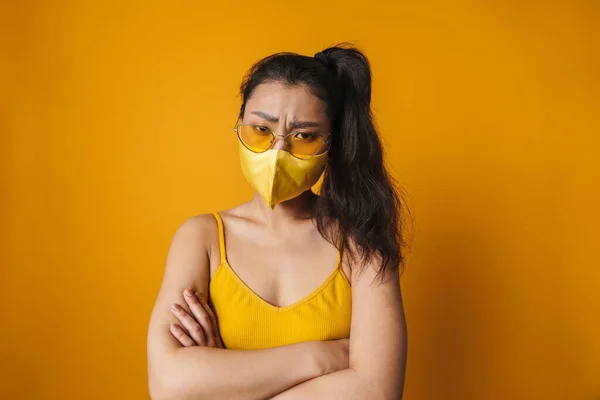 Frowning Young Asian Casual Woman Wearing Protective Medical Mask Standing — Stock Photo, Image