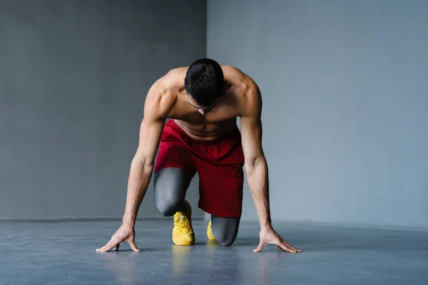 Young Shirtless Sportsman Doing Exercise While Working Out Indoors — Stock Photo, Image