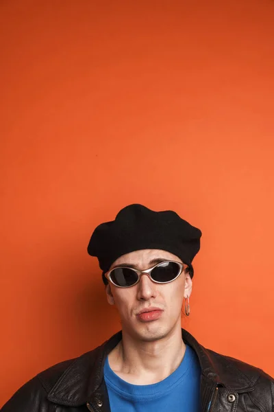 Young White Man Sunglasses Posing Looking Camera Isolated Orange Background — Stock Photo, Image