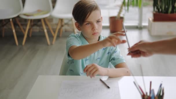 Small Boy Drawing Using Pencils Modern Art School — Stock Video