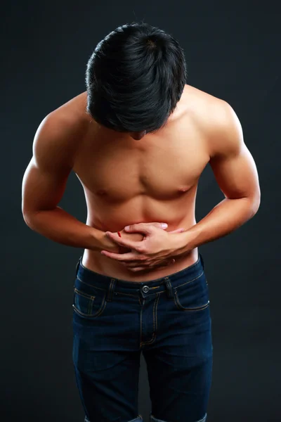 Handsome asian man isolated on black background — Stock Photo, Image