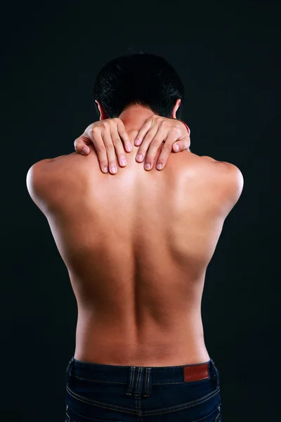 Handsome asian man isolated on black background — Stock Photo, Image