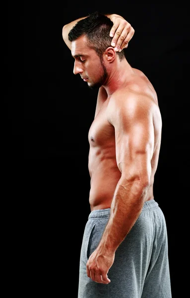 Handsome muscular man isolated — Stock Photo, Image