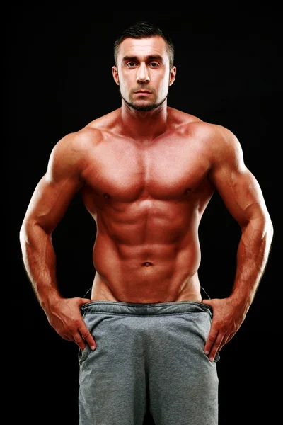 Handsome muscular man isolated — Stock Photo, Image