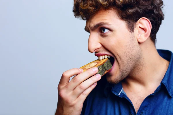 Handsome man with curly hair — Stock Photo, Image