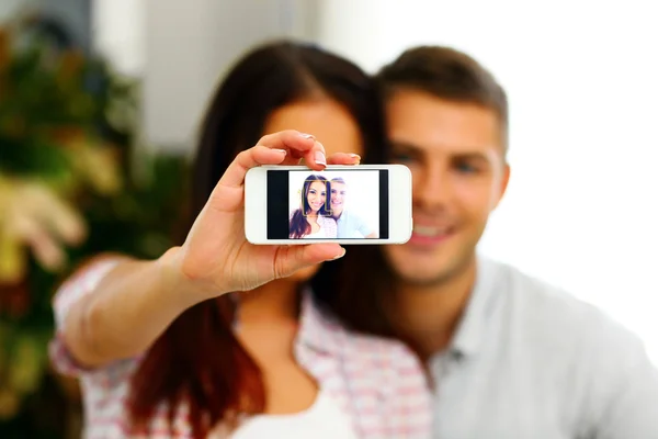 Portrait of a young beautiful couple at home — Stock Photo, Image