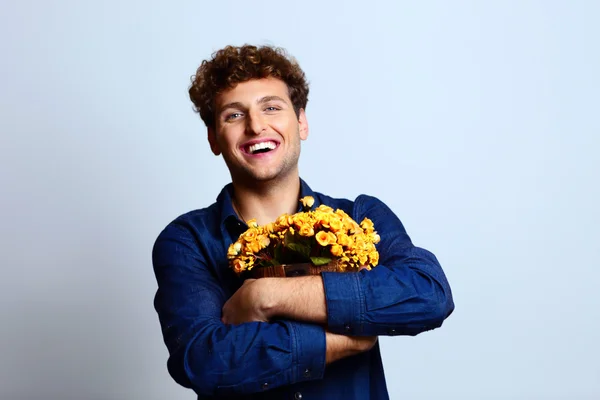 Handsome man with curly hair — Stock Photo, Image