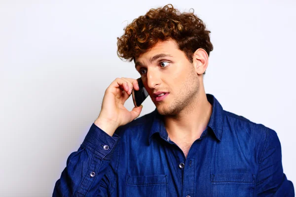 Handsome man with curly hair — Stock Photo, Image