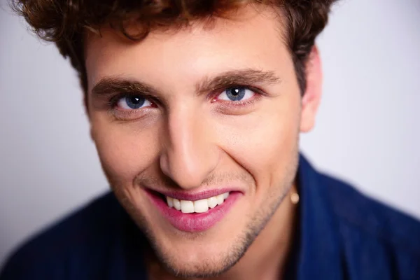 Handsome man with curly hair — Stock Photo, Image