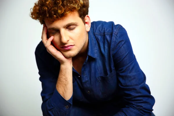 Handsome man with curly hair — Stock Photo, Image