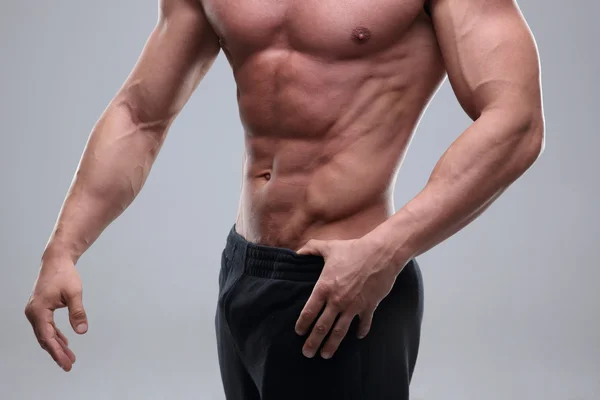 Hombre musculoso guapo aislado — Foto de Stock