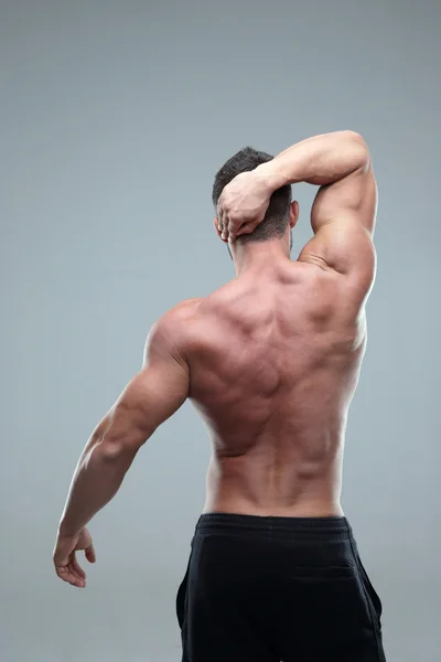 Bonito homem muscular isolado — Fotografia de Stock