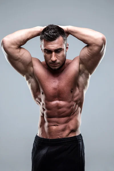 Handsome muscular man isolated — Stock Photo, Image