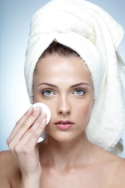 Portrait of a beauty woman isolated on a blue background Stock Image