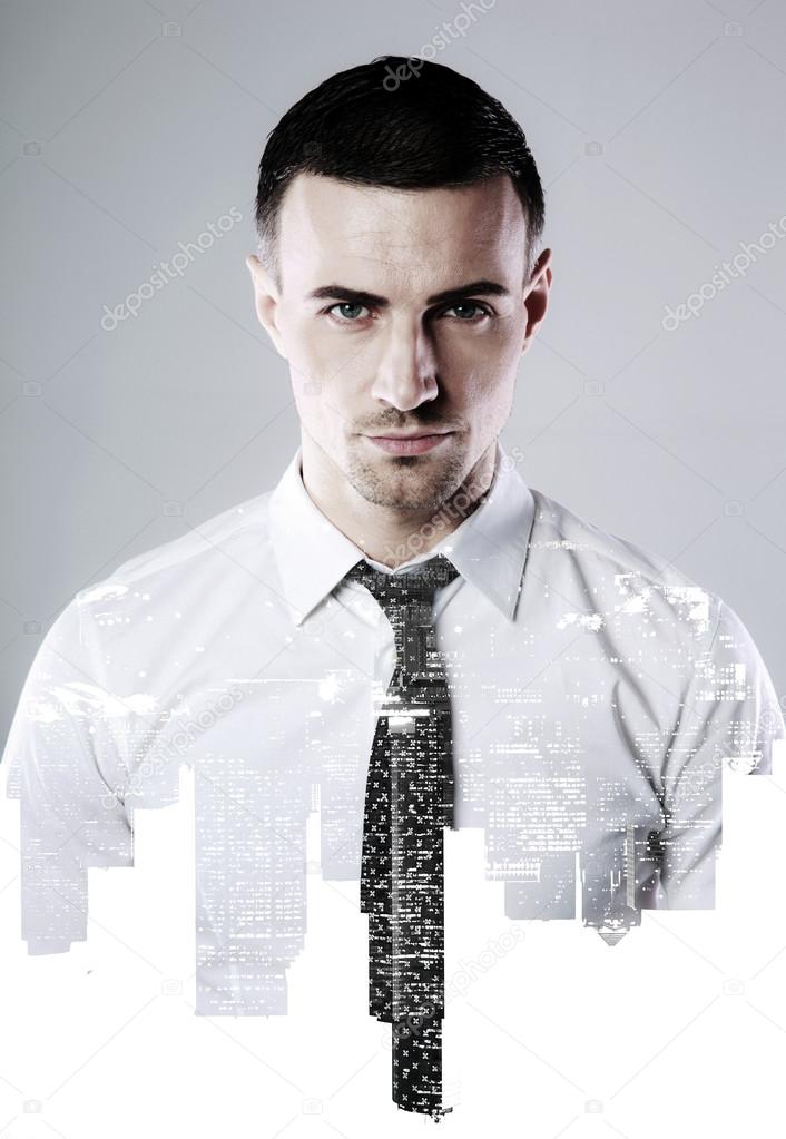 Double exposure of a businessman and city