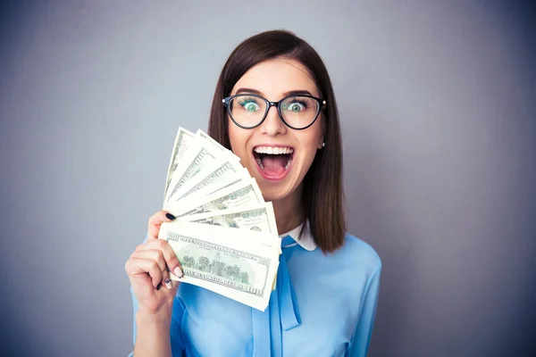 Businesswoman holding bill of dollars and shouting — Stock Photo, Image