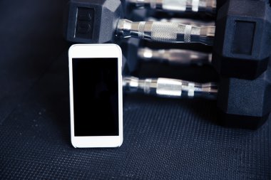 Boş ekran içinde jimnastik salonu ile Smartphone