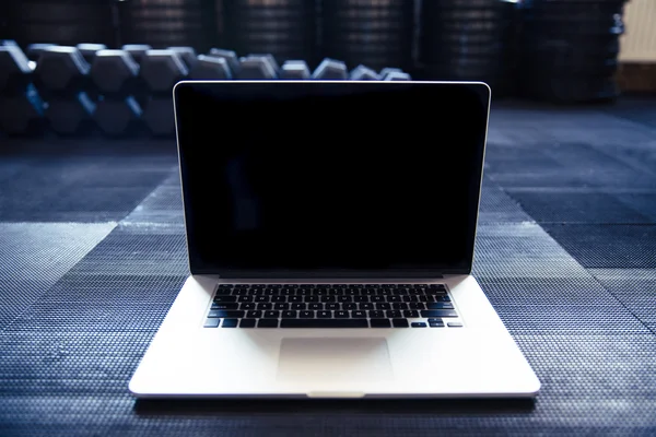 Laptop in gym — Stock Photo, Image