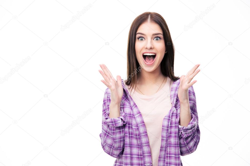 Surprised young female student over white background