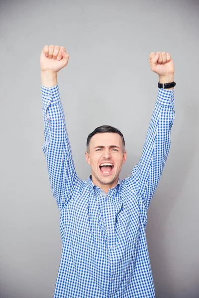 Man raised hands up. Making victory gesture — Stock Photo, Image