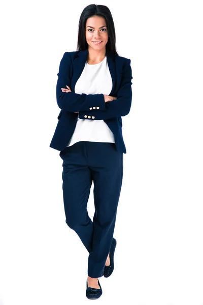 Smiling businesswoman standing with arms folded — Stock Photo, Image