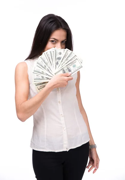 Jovem mulher cobrindo rosto com dinheiro — Fotografia de Stock