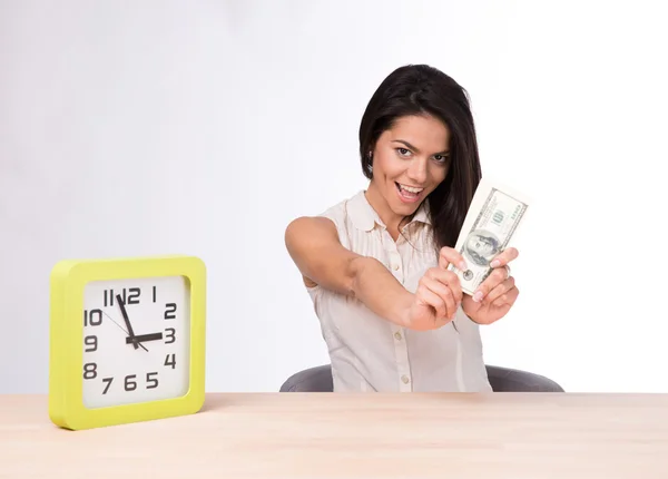 Laughing businesswoman sitting at the table with money — Stock Photo, Image