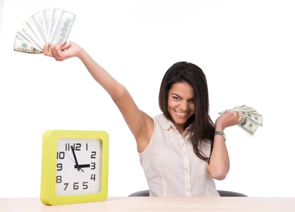 Businesswoman sitting at the table with mone — Stock Photo, Image