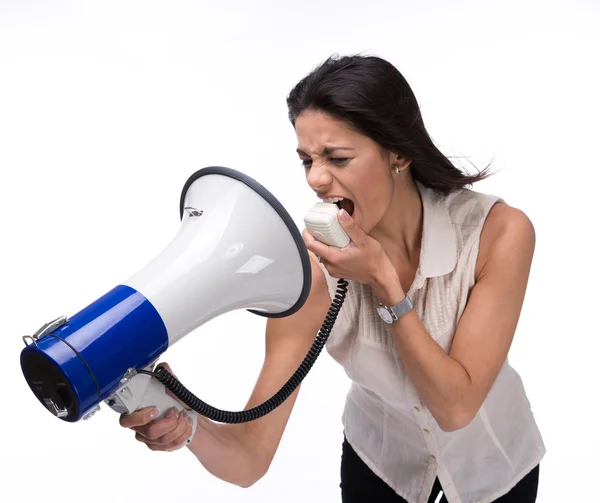 Imprenditrice che urla a se stessa con il megafono Immagine Stock