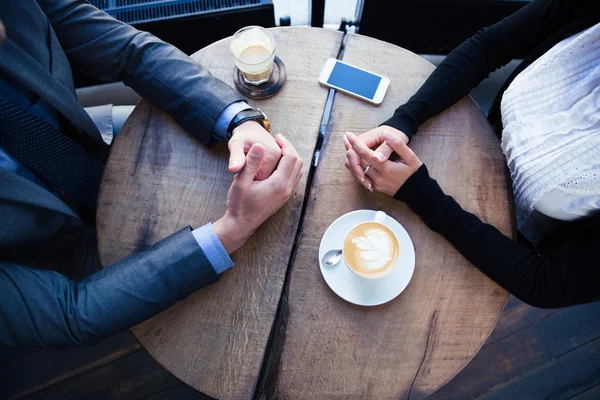 Businesswomans and businessmans hands on the table — Stock Photo, Image