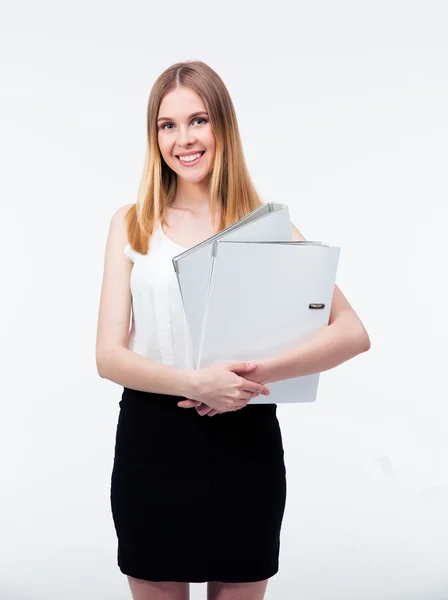 Smiling young business woman holding folders — Stock Photo, Image