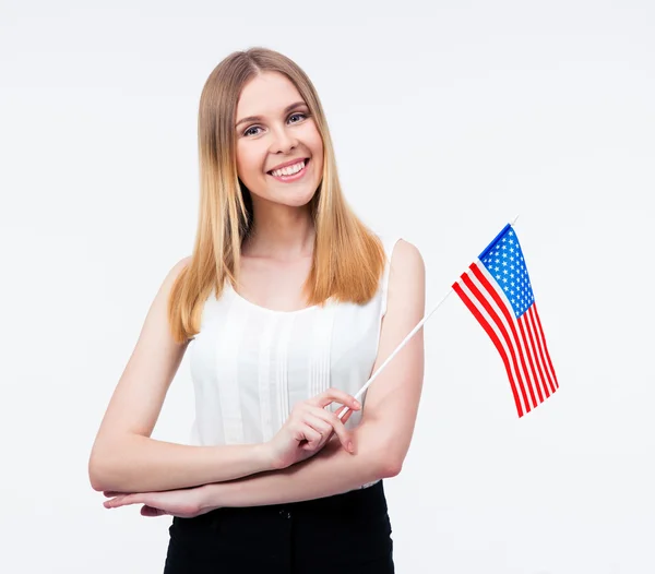 Feliz joven empresaria sosteniendo bandera de EE.UU. — Foto de Stock
