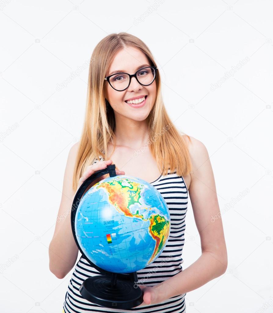 Young girl in glasses holding world globe
