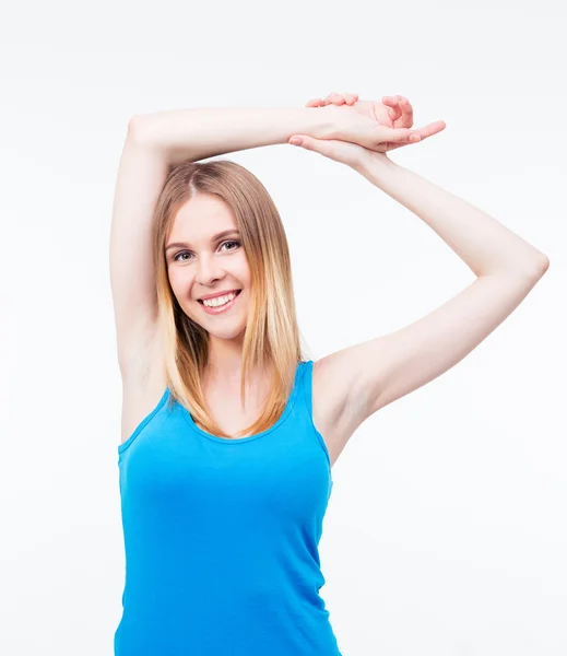 Sonriente hermosa mujer posando sobre fondo gris —  Fotos de Stock