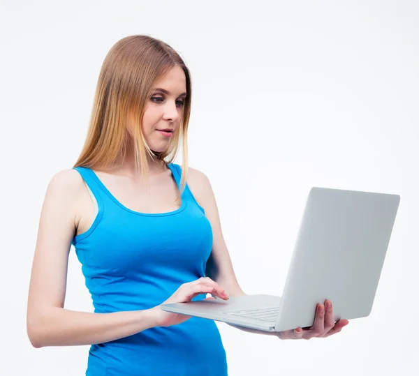 Young beautiful woman using laptop over white background — Stock Photo, Image
