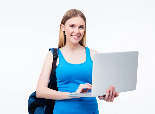 Happy casual woman using laptop — Stock Photo, Image