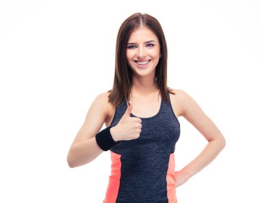 başparmak gösterilen mutlu fitness kadın 
