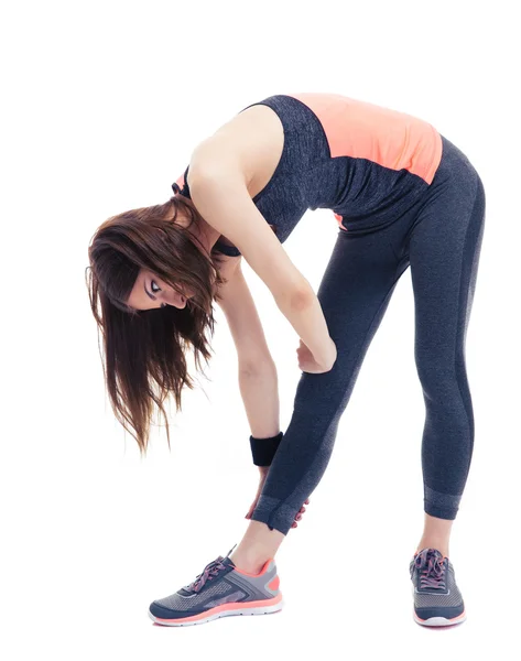 Jovem mulher fitness fazendo exercício de alongamento — Fotografia de Stock